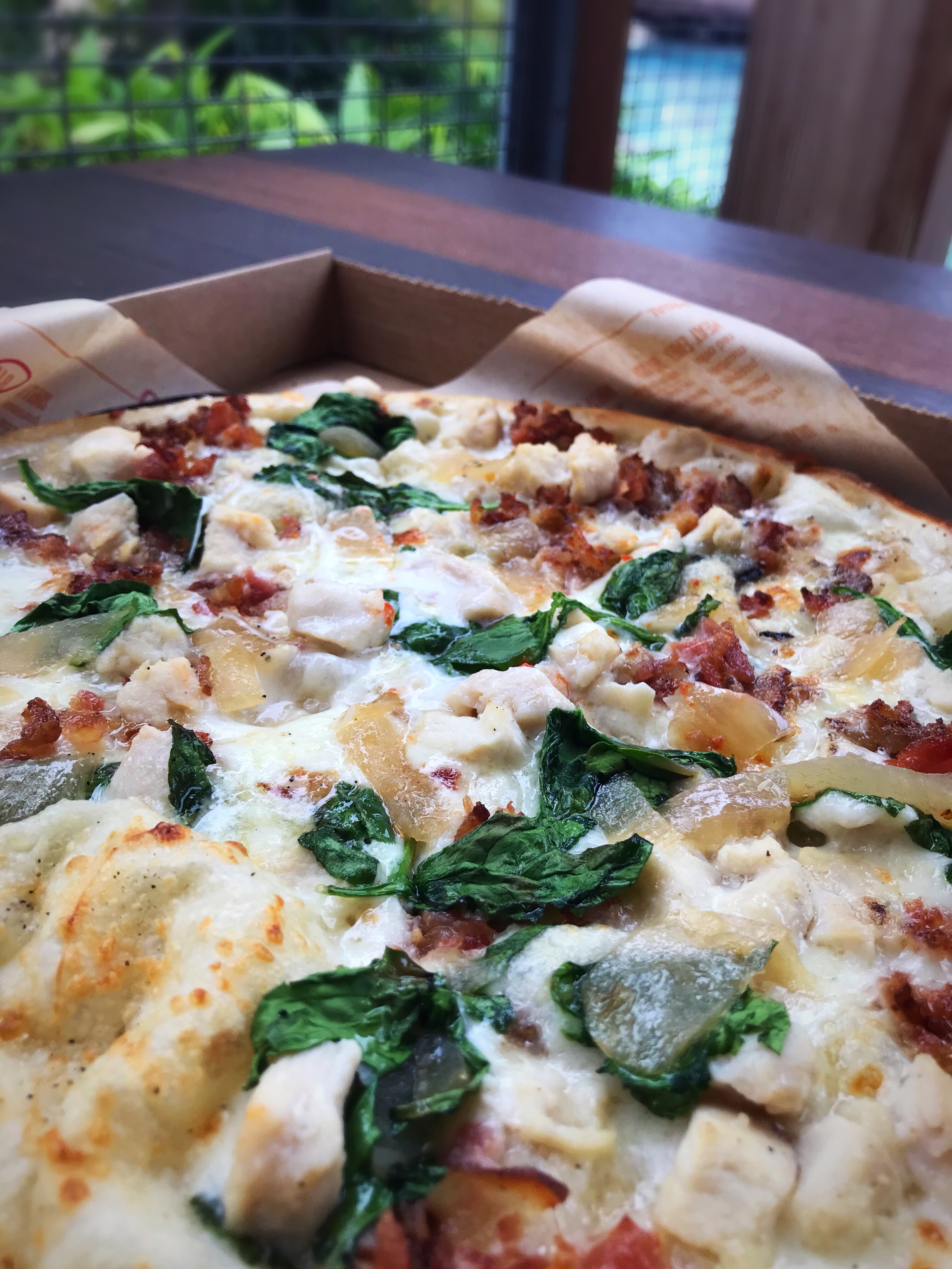 Regular crust, white sauce, mozzarella and gorgonzola cheeses, chicken and applewood bacon, sautéed onions and spinach